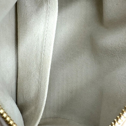 interno Borsa Louis Vuitton in pelle base avorio con monogram Empreinte Giant color pesca con parti metalliche dorate; munita di un accessorio portamonete amovibile, una tracolla in tessuto amovibile e regolabile e doppi manici stondati. Completa di scatola, di lusso, originale, eccellenti condizioni, usata. 