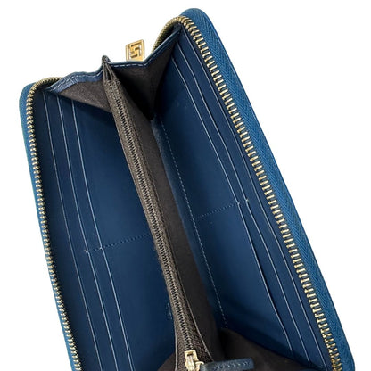 Portafoglio Fendi in tessuto trama Zucca color tabacco con finiture in pelle blu e parti metalliche dorate. Completo di corredo, di lusso, originale, ottime condizioni.