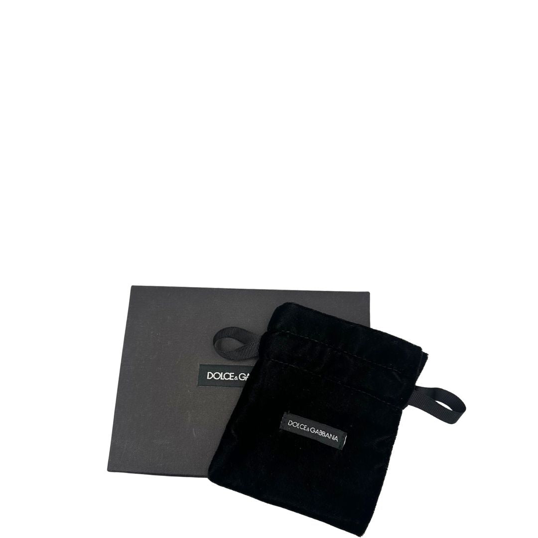 Portamonete Dolce & Gabbana in pelle nera con dettagli dorati. Completo di corredo, di lusso, originale, eccellenti condizioni.