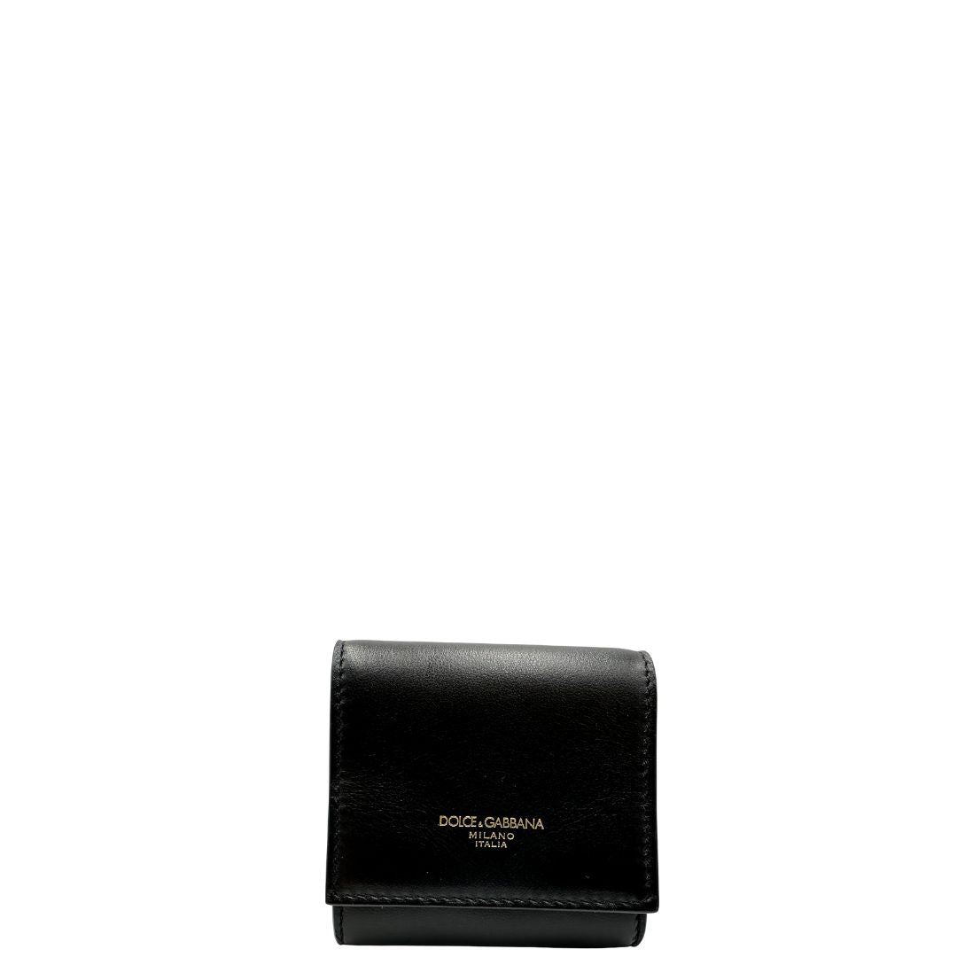 Portamonete Dolce & Gabbana in pelle nera con dettagli dorati. Completo di corredo, di lusso, originale, eccellenti condizioni.