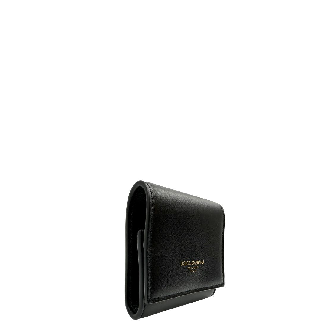 Portamonete Dolce & Gabbana in pelle nera con dettagli dorati. Completo di corredo, di lusso, originale, eccellenti condizioni.
