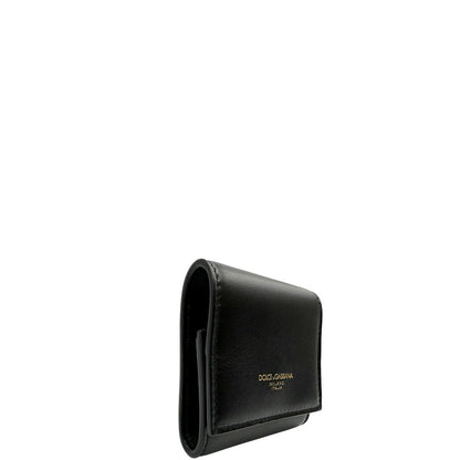 Portamonete Dolce & Gabbana in pelle nera con dettagli dorati. Completo di corredo, di lusso, originale, eccellenti condizioni.