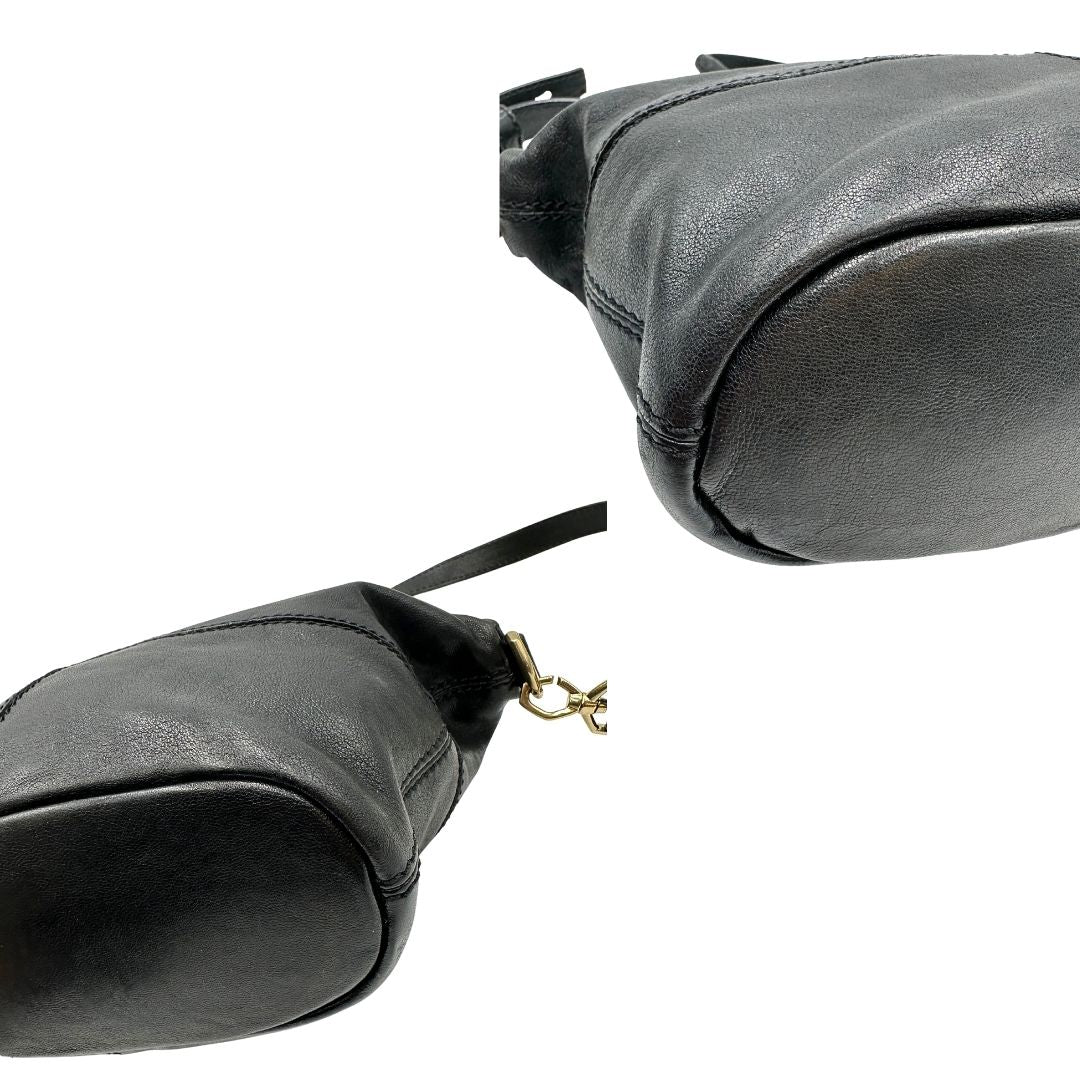 angoli Borsa Nightingale Givenchy in pelle nera con parti metalliche dorate; munita di doppi manici e una tracolla amovibile e regolabile. Completa di dustbag, di lusso, originale, ottime condizioni. 