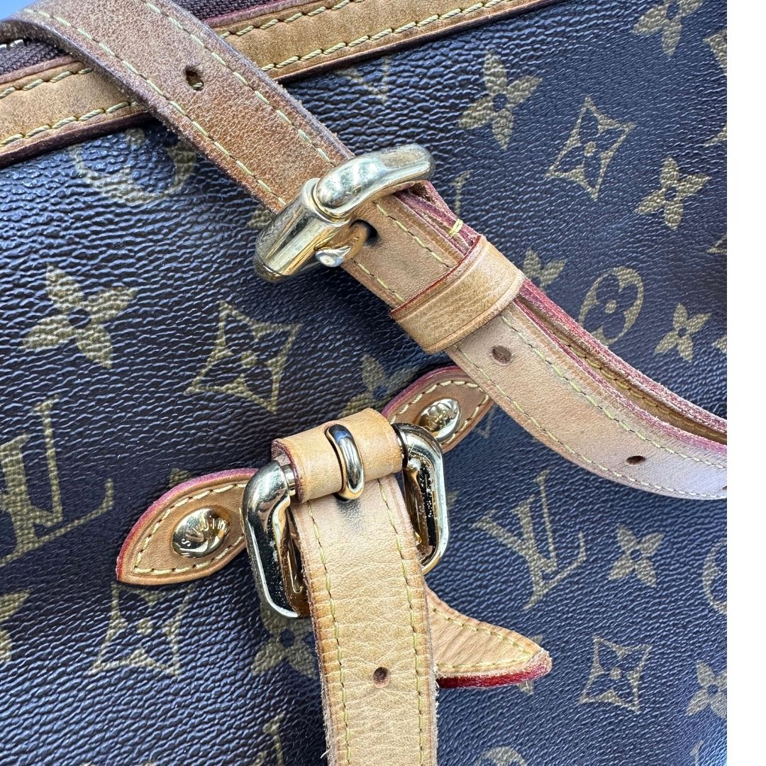 Borsa Palermo GM Louis Vuitton in canvas marrone monogram con finiture in vacchetta naturale e parti metalliche dorate. Originale, usato, di lusso, in ottime condizioni.