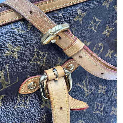 Borsa Palermo GM Louis Vuitton in canvas marrone monogram con finiture in vacchetta naturale e parti metalliche dorate. Originale, usato, di lusso, in ottime condizioni.