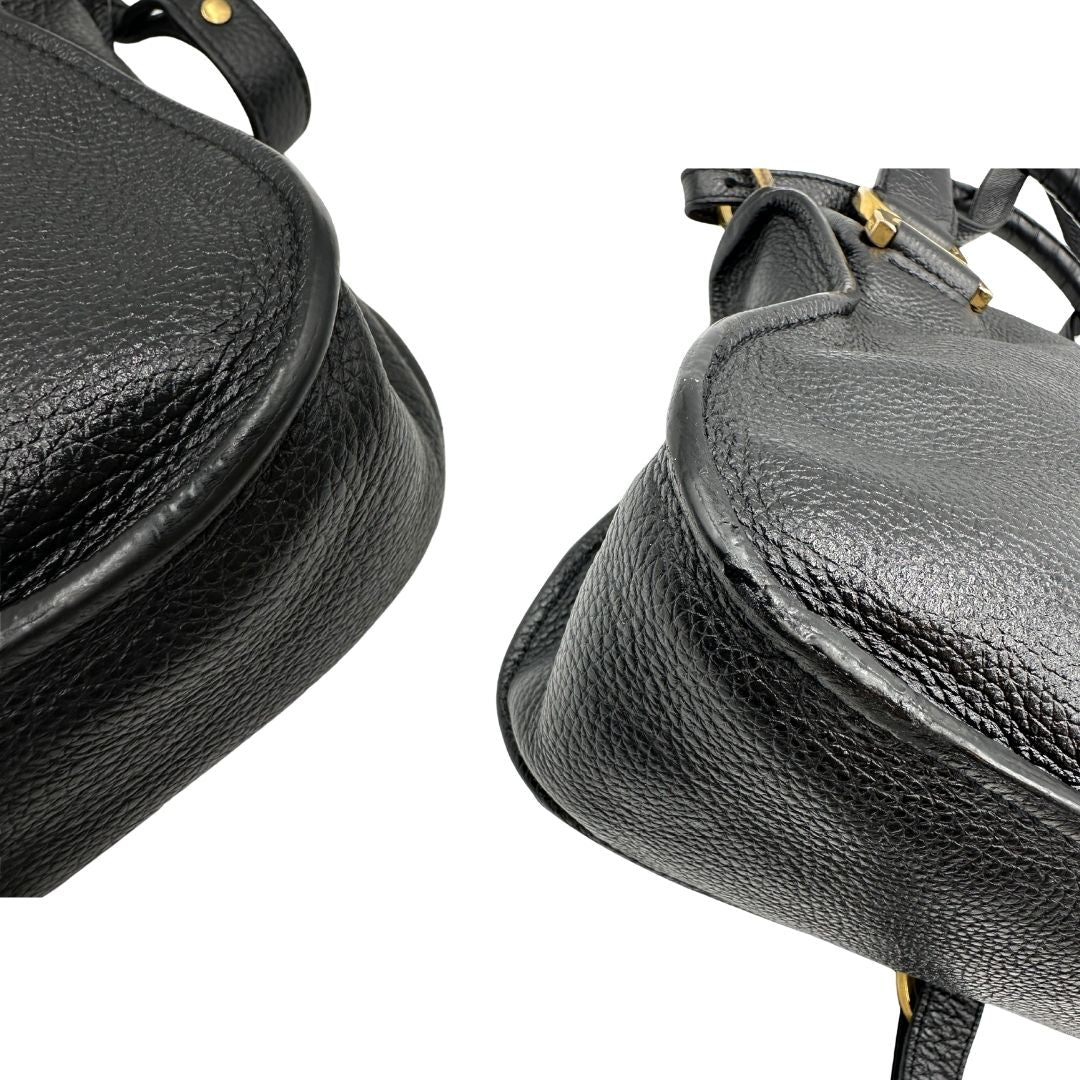 angoli  Borsa Chloè in pelle nera con parti metalliche dorate; munita di doppi manici stondati e una tracolla, di lusso, originale, usata. 