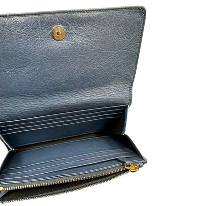 Portafoglio Balenciaga in pelle crinkled blu polveroso con parti metalliche dorate. Completa di dustbag. Originale, usato, di lusso, in ottime condizioni.