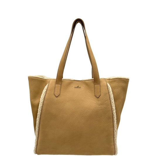 front Borsa Hogan in pelle scamosciata beige con finiture e interno effetto shearling; munita di doppi manici, da portare a spalla. Completa di dustbag, di lusso, originale, ottime condizioni. 