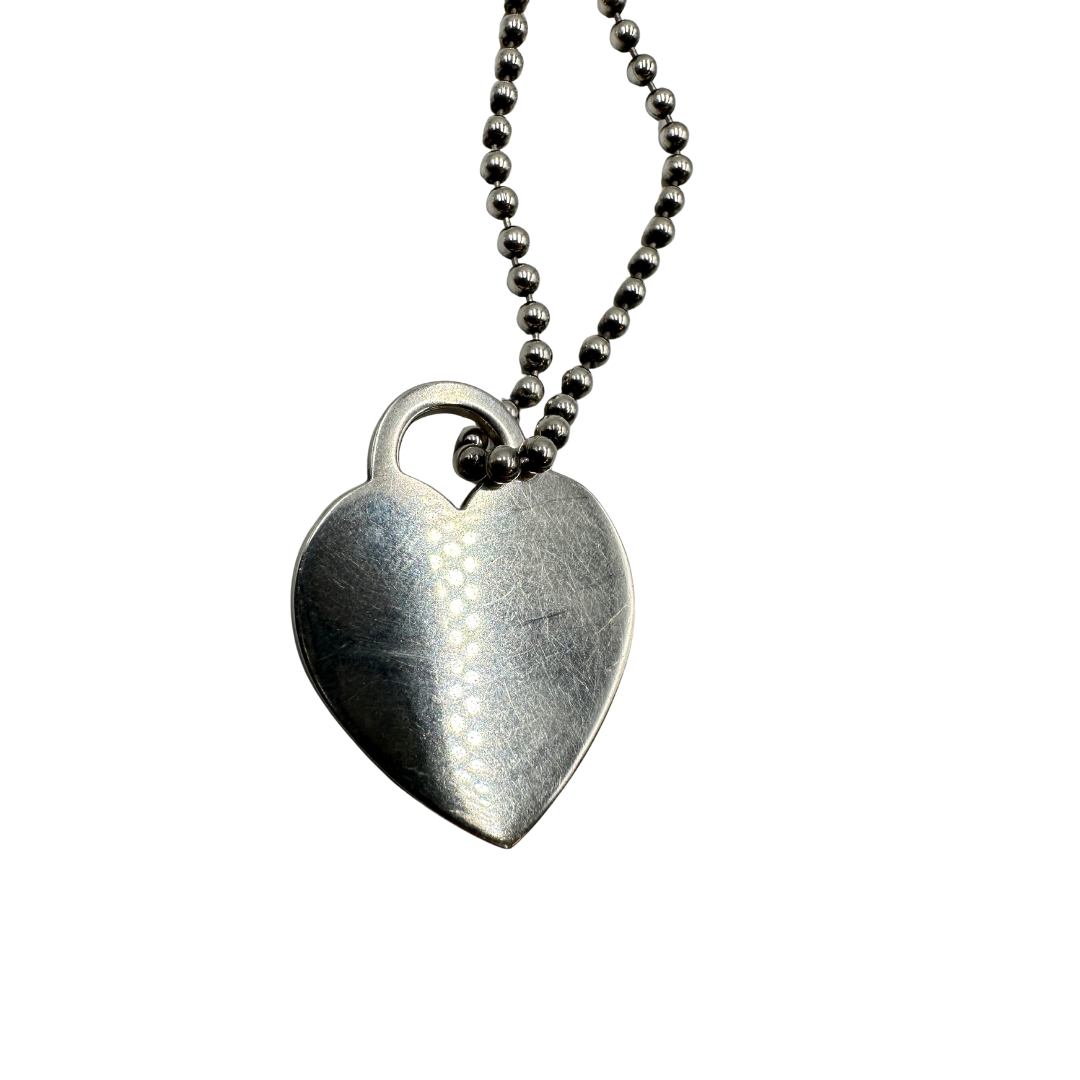 Collana Tiffany&Co. della collezione Return To Tiffany in argento 925 con ciondolo cuore. Originale, usata, di lusso, in ottime condizioni.
