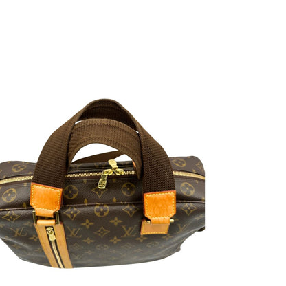 Manici di una Borsa Louis Vuitton in canvas marrone monogram con finiture in vacchetta naturale e parti metalliche dorate; munita di due manici e una tracolla in tessuto regolabile. Completa di dustbag. Originale, usata, di lusso, in ottime condizioni.