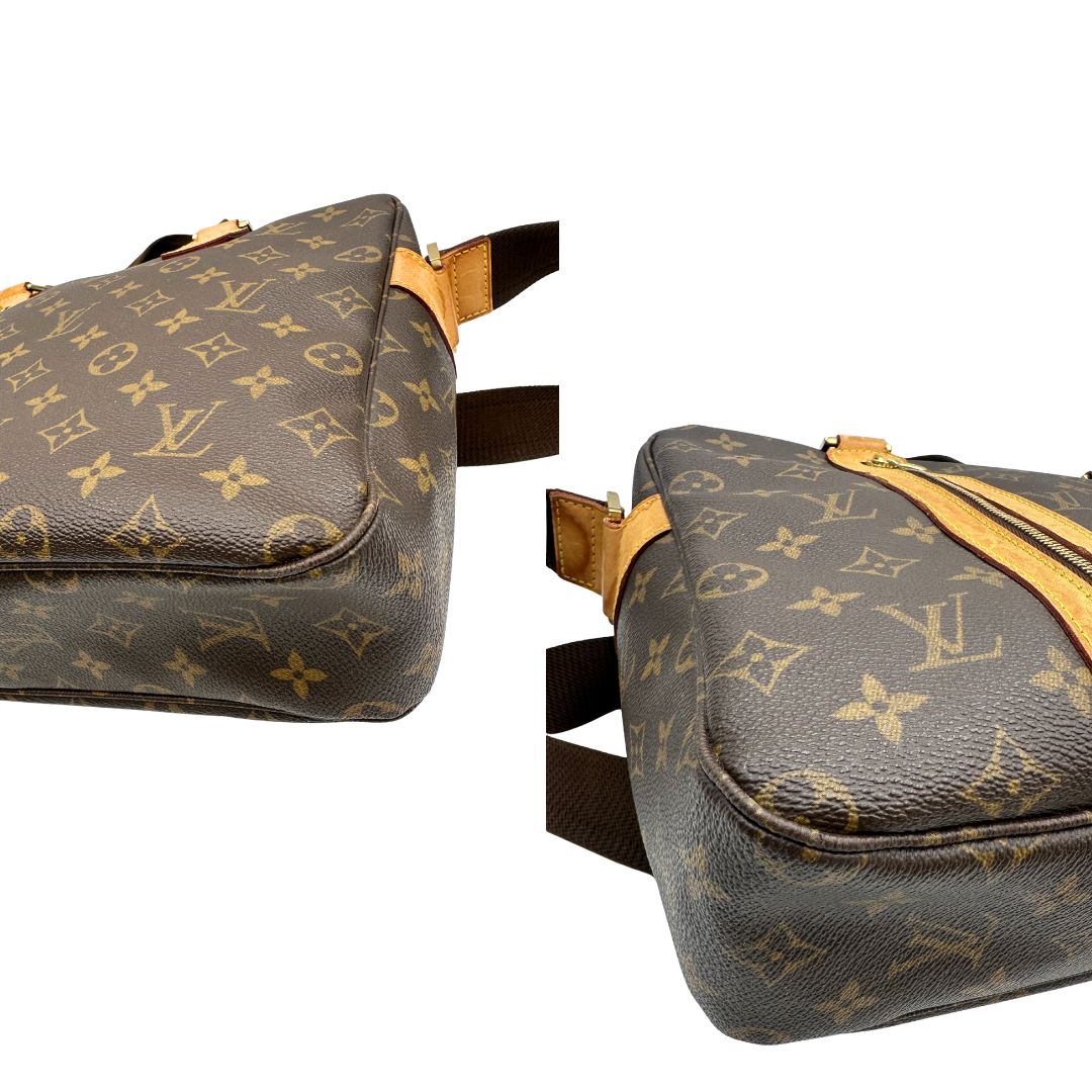 Angoli di una Borsa Louis Vuitton in canvas marrone monogram con finiture in vacchetta naturale e parti metalliche dorate; munita di due manici e una tracolla in tessuto regolabile. Completa di dustbag. Originale, usata, di lusso, in ottime condizioni.
