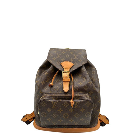 front Zaino LV in canvas marrone monogram con finiture in vacchetta naturale e parti metalliche dorate; munito di due bretelle in tessuto tono su tono. Completo di dustbag, di lusso, originale, ottime condizioni. 