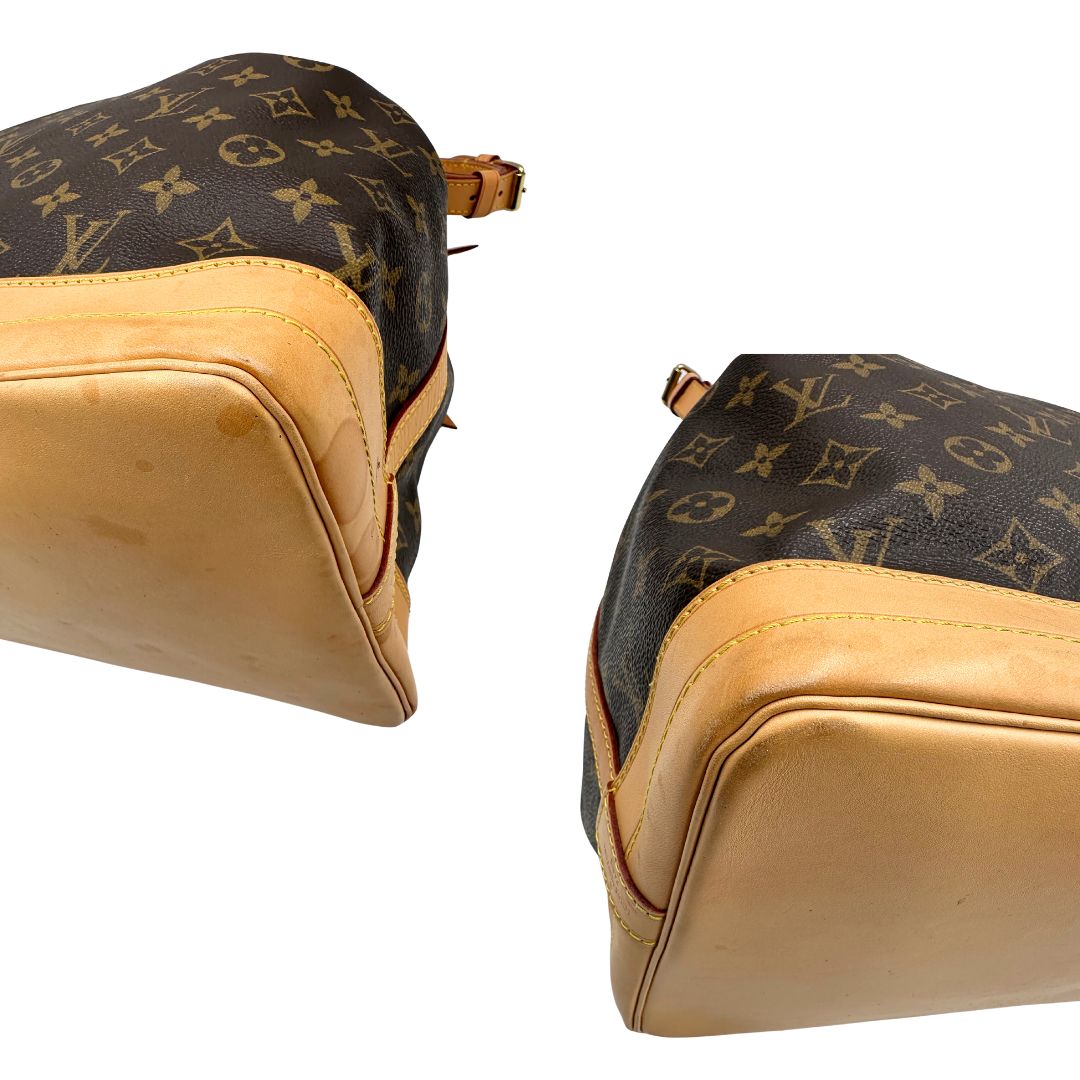 Angoli di un Secchiello Noé Louis Vuitton in canvas marrone monogram con finiture in vacchetta naturale, tracolla regolabile con fibbia e parti metalliche dorate. Completo di dustbag. Originale, usato, di lusso, in ottime condizioni
