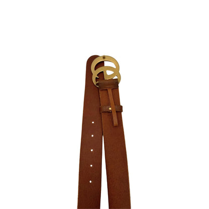 Cintura Gucci in pelle marrone bruciato, fibbia GG in metallo dorato. Completa di dustbag. Originale, usato, di lusso, in ottime condizioni.