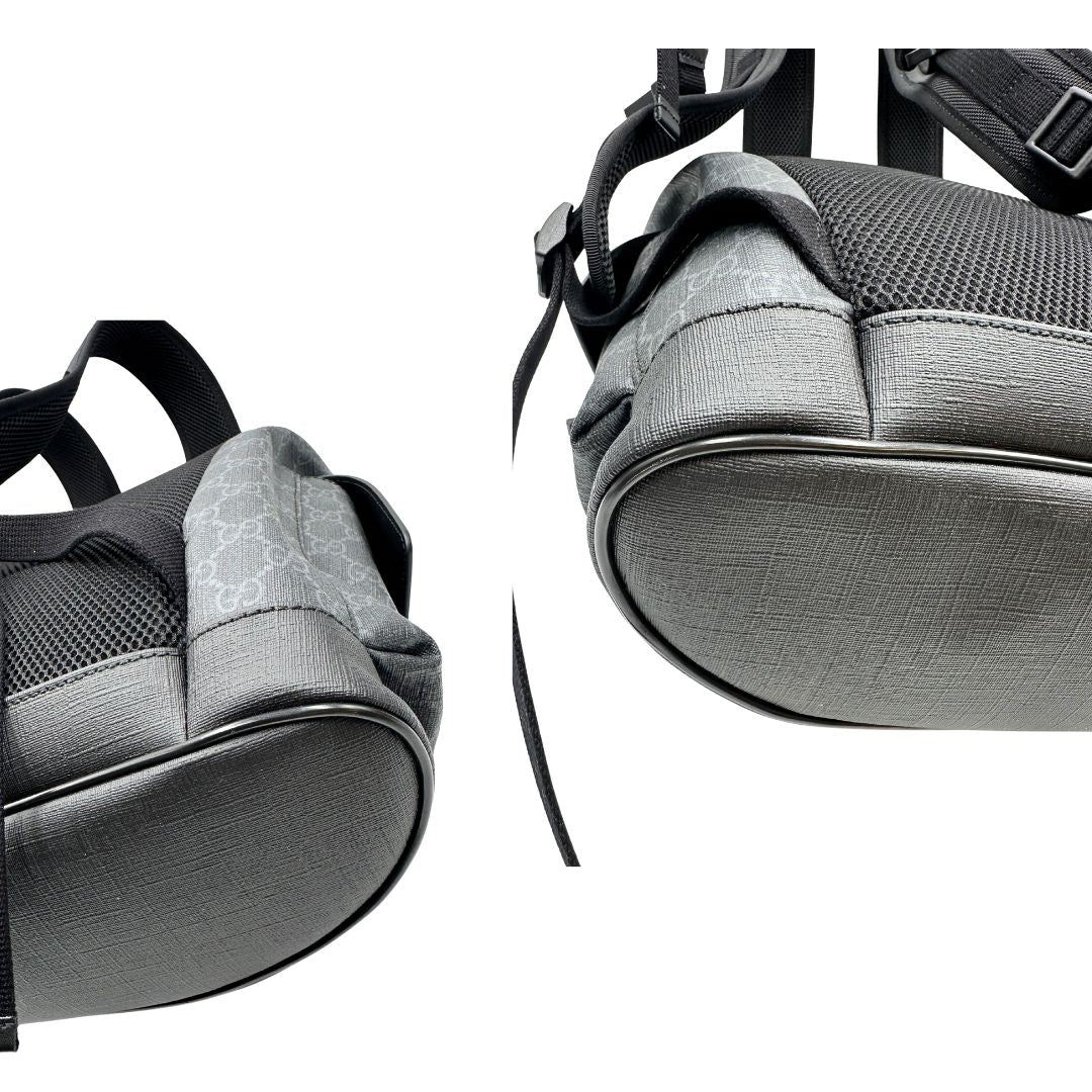 Angoli di un Zaino Gucci in canvas grigio GG con finiture in pelle neri e parti metalliche argentate. Iconica striscia Web in blu/rosso sul front, munito di un manico singolo, Bretelle imbottite regolabili e patta con moschettoni a scatto. Completo di dustbag. Originale, usato, di lusso, in condizioni eccellenti.