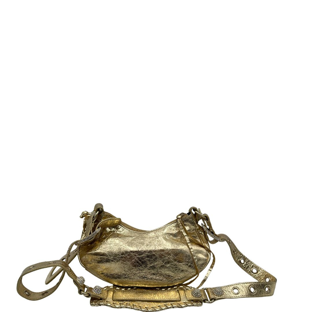  retro Borsa Balenciaga in pelle dorata con parti metalliche dorate, impreziosita da borchie con cristalli incastonati; munita di una tracolla regolabile. Completa di dustbag, di lusso, originale, ottime condizioni. 