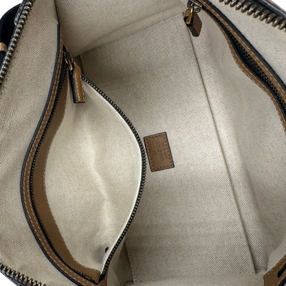interno Borsa Gucci in tessuto GG nera con finiture in pelle marroni, dettagli Web verdi e rossi e parti metalliche dorate; munita di doppi manici stondati e una tracolla in tessuto amovibile e regolabile. Completo di dustbag, lucchetto e chiavi, di lusso, usata, originale.