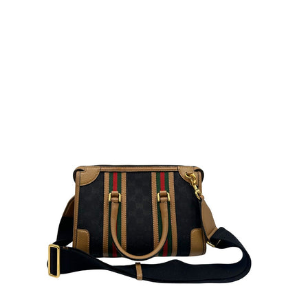 retro Borsa Gucci in tessuto GG nera con finiture in pelle marroni, dettagli Web verdi e rossi e parti metalliche dorate; munita di doppi manici stondati e una tracolla in tessuto amovibile e regolabile. Completo di dustbag, lucchetto e chiavi, di lusso, usata, originale.