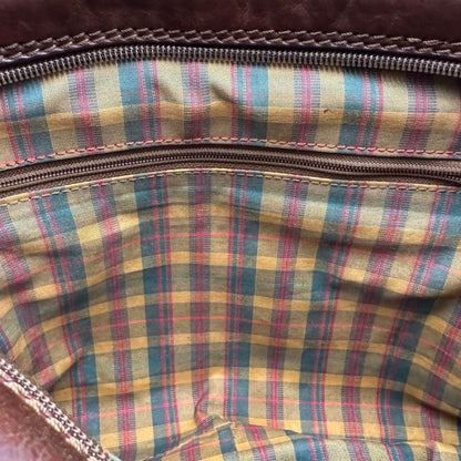 interno Borsa The Bridge in pelle marrone con parti metalliche dorate; munita di una tracolla regolabile. Completa di dustbag, di lusso, originale, ottime condizioni. 