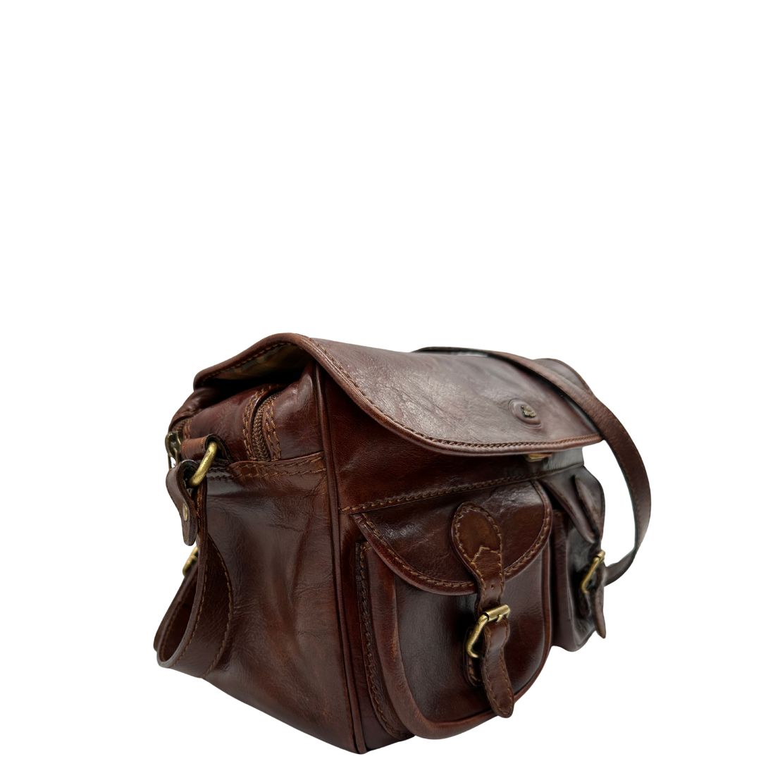 lato Borsa The Bridge in pelle marrone con parti metalliche dorate; munita di una tracolla regolabile. Completa di dustbag, di lusso, originale, ottime condizioni.