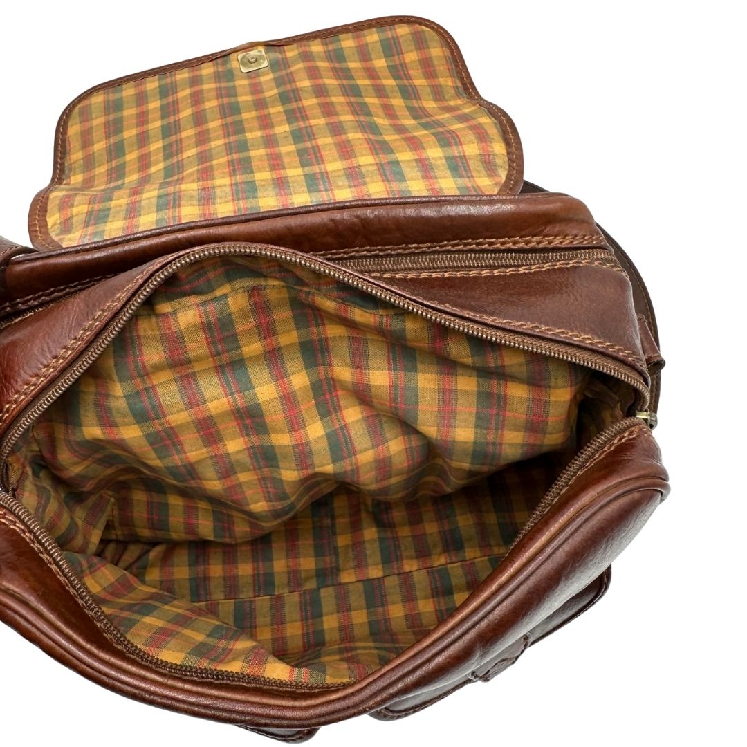 interno Borsa The Bridge in pelle marrone con parti metalliche dorate; munita di una tracolla regolabile. Completa di dustbag, di lusso, originale, ottime condizioni. 