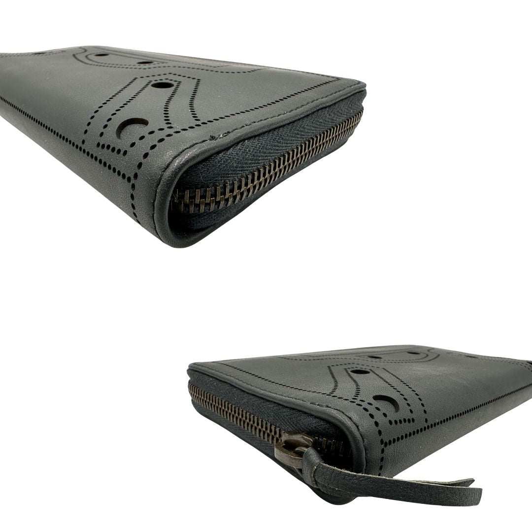 Angoli di un portafoglio Balenciaga in pelle grigia e parti metalliche in oro anticato. Full set.