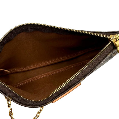 INTERNO Multi Pochette Accessoires Louis Vuitton in canvas marrone monogram con dettagli in vacchetta naturale, manico in catena dorata e tracolla in tessuto Jacquard verde kaki. Dotata del classico mini portamonete rotondo, rimovibile. Full set, di lusso, originale, ottime condizioni  