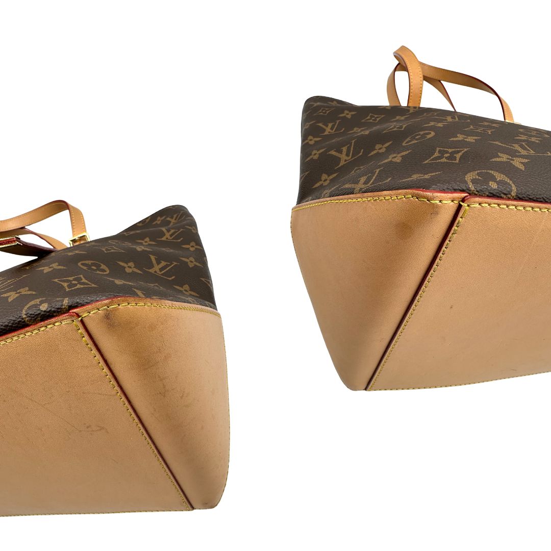 Angoli di una Borsa Louis Vuitton Mezzo in canvas marrone monogram con finiture in vacchetta naturale e parti metalliche dorate; munita di doppi manici Leggermente regolabili. Indossabile a spalla. Originale, usato, di lusso, in ottime condizioni.