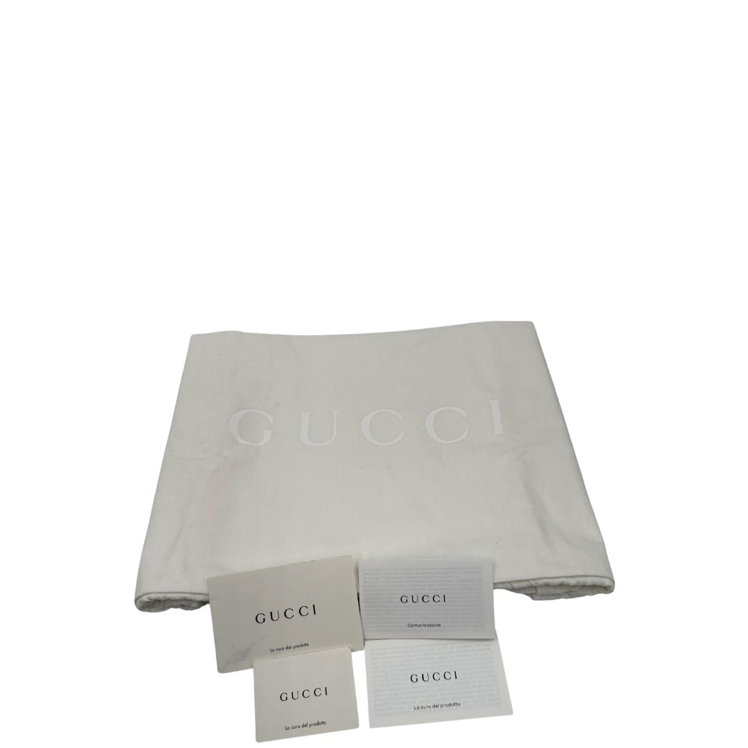 dustbag Borsa Gucci in pelle martellata beige con parti metalliche oro chiaro; munita di doppi manici stondati e una tracolla regolabile. Completa di dustbag, di lusso, originale, eccellenti condizioni, usata. 