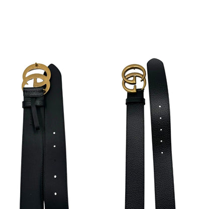 Cintura Gucci Marmont in pelle nera, impreziosita da fibbia GG in metallo dorato. Completa di dustbag e scatola logata, di lusso, originale, ottime condizioni, usata.