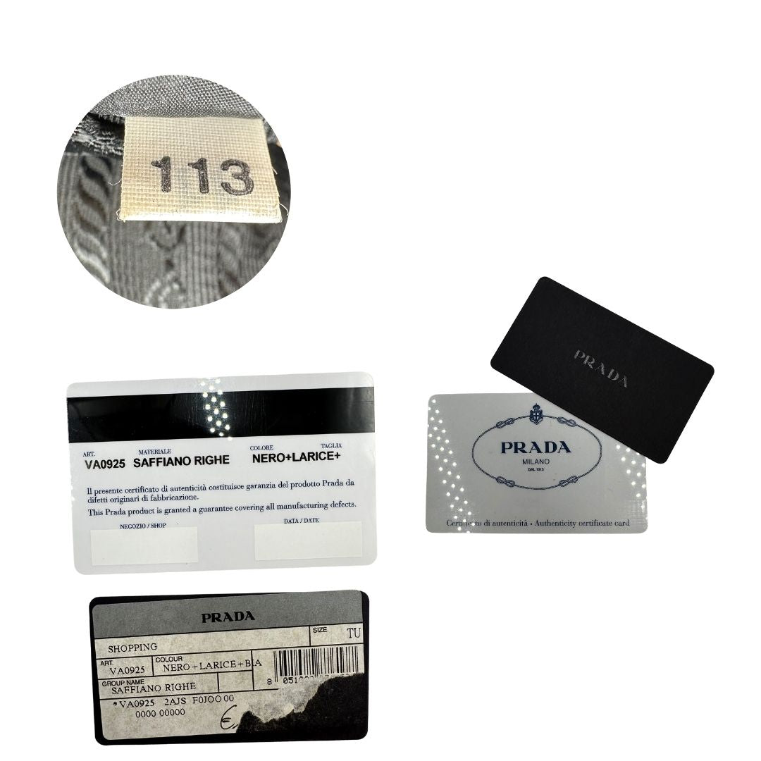 Borsa Prada in pelle saffiano nera con strisce verdi e bianche; munita di doppi manici e una tracolla amovibile e regolabile, di lusso, originale, ottime condizioni, usata. 