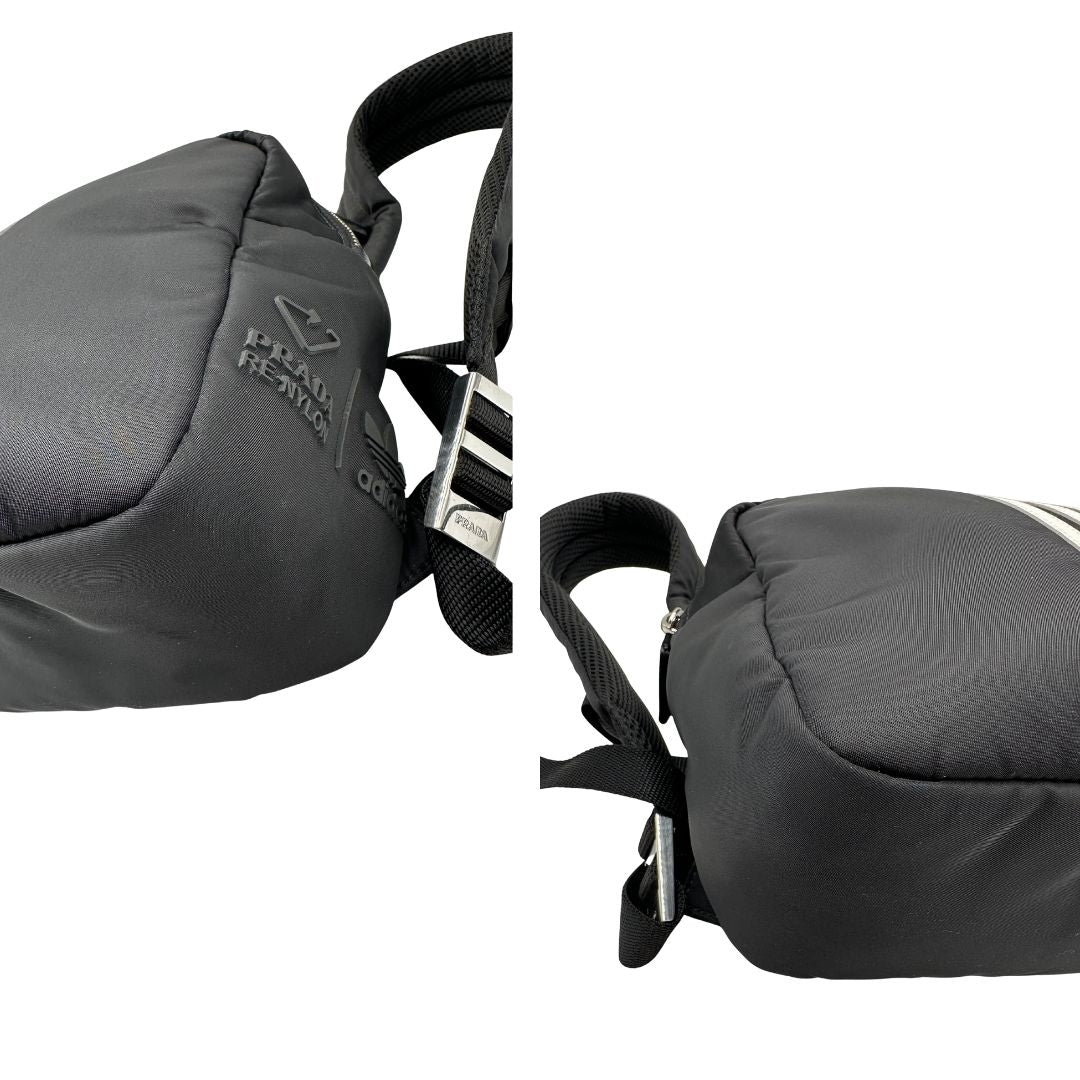 Angoli di uno zaino Prada x Adidas in Re-Nylon con chiusura a zip. Struttura con tasca frontale a zip e tasca superiore integrata negli spallacci. Spallacci regolabili con imbottitura e pannello posteriore in mesh. Dettagli con logo triangolo Prada sul lato superiore e branding Prada Re-Nylon e Adidas sul fianco.