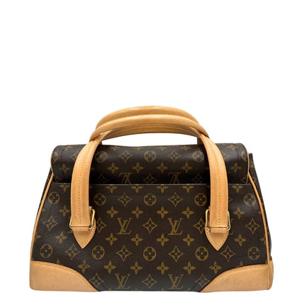 Retro di una Borsa Beverly LV in canvas marrone monogram, finiture in vacchetta naturale e metalleria dorata. Indossabile a spalla oppure a mano. Originale, usata, di lusso, in ottime condizioni.