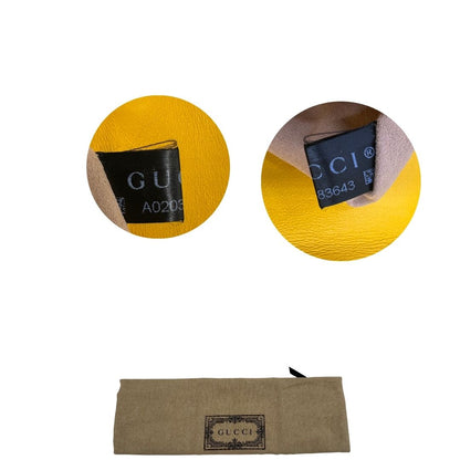 dustbag Borsa Gucci Marmont in pelle gialla con parti metalliche dorate; impreziosita da doppia G sul front e munita di una tracolla in catena scorrevole con spallaccio in pelle. Completa di dustbag, di lusso, originale, ottime condizioni. 