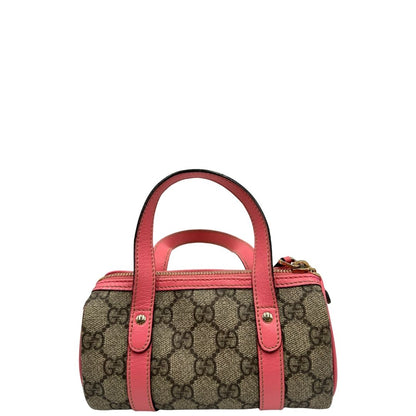 retro Borsa Gucci in tessuto beige GG con finiture in pelle rosa e parti metalliche dorate; munita di doppi manici, indossabile a spalla. Completa di dustbag, di lusso, originale, ottime condizioni. 