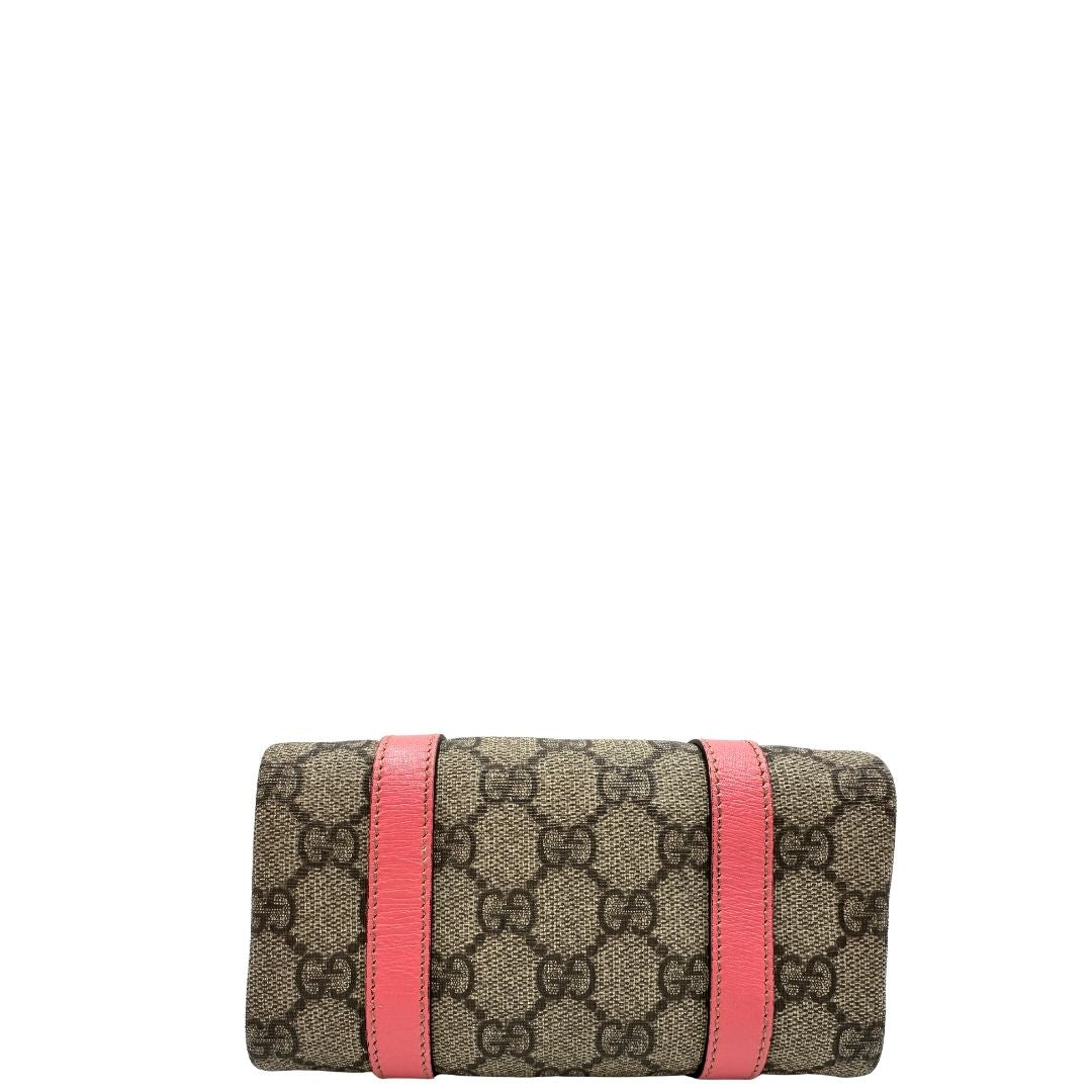 base Borsa Gucci in tessuto beige GG con finiture in pelle rosa e parti metalliche dorate; munita di doppi manici, indossabile a spalla. Completa di dustbag, di lusso, originale, ottime condizioni. 