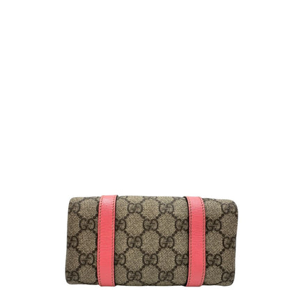 base Borsa Gucci in tessuto beige GG con finiture in pelle rosa e parti metalliche dorate; munita di doppi manici, indossabile a spalla. Completa di dustbag, di lusso, originale, ottime condizioni. 