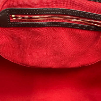 interno Borsa Speedy 35 in canvas Damier Ébène marrone con finiture in pelle marrone e parti metalliche dorate; munita di una tracolla amovibile e regolabile e doppi manici stondati. Completa di scatola, lucchetto e chiavi, di lusso, originale, usata.