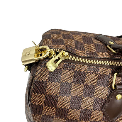 Borsa Speedy 35 in canvas Damier Ébène marrone con finiture in pelle marrone e parti metalliche dorate; munita di una tracolla amovibile e regolabile e doppi manici stondati. Completa di scatola, lucchetto e chiavi, di lusso, originale, usata. 