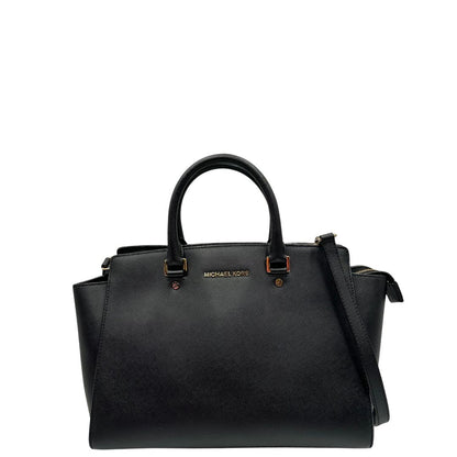 front Borsa Michael Kors in pelle saffiano nera con parti metalliche dorate; munita di doppi manici stondati e una tracolla amovibile e regolabile, di lusso, originale, ottime condizioni.