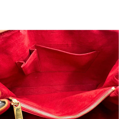 Interno di una Borsa Griet LV in canvas marrone monogram, finiture in vacchetta naturale e metalleria dorata. Indossabile a spalla oppure a mano. Originale, usata, di lusso, in ottime condizioni.