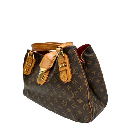 Lato sinistro di una Borsa Griet LV in canvas marrone monogram, finiture in vacchetta naturale e metalleria dorata. Indossabile a spalla oppure a mano. Originale, usata, di lusso, in ottime condizioni.