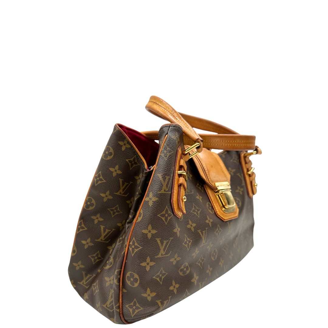 Lato destro di una Borsa Griet LV in canvas marrone monogram, finiture in vacchetta naturale e metalleria dorata. Indossabile a spalla oppure a mano. Originale, usata, di lusso, in ottime condizioni.