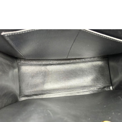 interno Borsa Louis Vuitton L.E. in canvas marrone monogram con finiture in pelle nera e parti metalliche dorate, impreziosita da motivo decorativo floreale verniciato nero e un porta address amovibile; munita di doppi manici stondati e una tracolla amovibile. Completa di dustbag, di lusso, originale, ottime condizioni. 