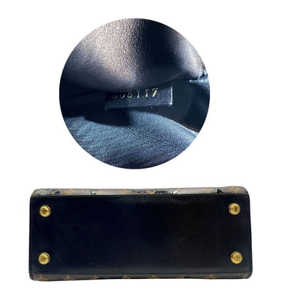 base Borsa Louis Vuitton L.E. in canvas marrone monogram con finiture in pelle nera e parti metalliche dorate, impreziosita da motivo decorativo floreale verniciato nero e un porta address amovibile; munita di doppi manici stondati e una tracolla amovibile. Completa di dustbag, di lusso, originale, ottime condizioni. 