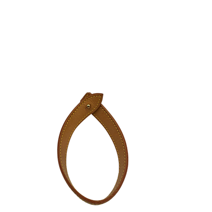 Manico di un Zaino Louis Vuitton in canvas marrone monogram con finiture in vacchetta naturale e parti metalliche dorate; munita di un cinturino centrale con fibbia e un manico amovibili. Indossabile a spalla. Completa di dustbag. Originale, usata, di lusso, in ottime condizioni.