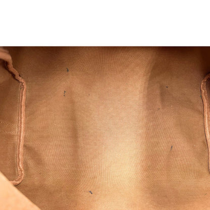 Interno di una Borsa Speedy 35 in canvas marrone monogram con finiture in vacchetta naturale e parti metalliche dorate; munita di doppi manici stondati e una tracolla amovibile e regolabile. Completa di lucchetto e chiavi. Originale, usato, di lusso, in ottime condizioni.