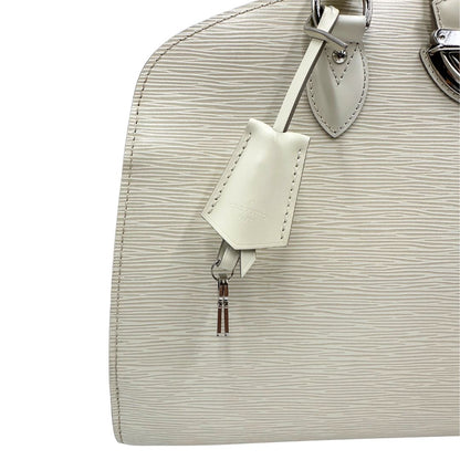 clochette Borsa Louis Vuitton in pelle epi bianco gesso con parti metalliche argentate; munita di doppi manici stondati, da portare a mano. Completa di lucchetto e chiavi, di lusso, originale, ottime condizioni, usata. 