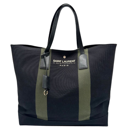 front Borsa Saint Laurent in tessuto nero con bande verdi e finiture in pelle; munita di doppi manici e un accessorio portachiavi. Completa di dustbag, di lusso, originale, ottime condizioni. 