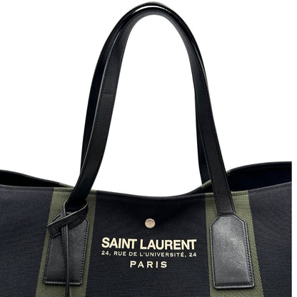 manico Borsa Saint Laurent in tessuto nero con bande verdi e finiture in pelle; munita di doppi manici e un accessorio portachiavi. Completa di dustbag, di lusso, originale, ottime condizioni. 
